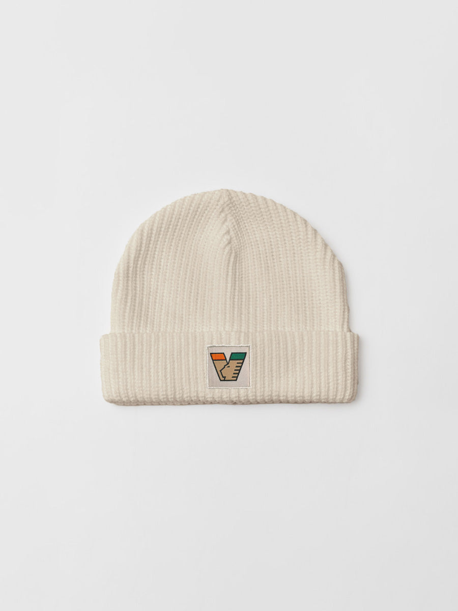 thumbnail interactive-video image 1 of Just 4 Kicks Italy Winter Beanie – Blue & White Pom Pom Knit Hat 1 of 3