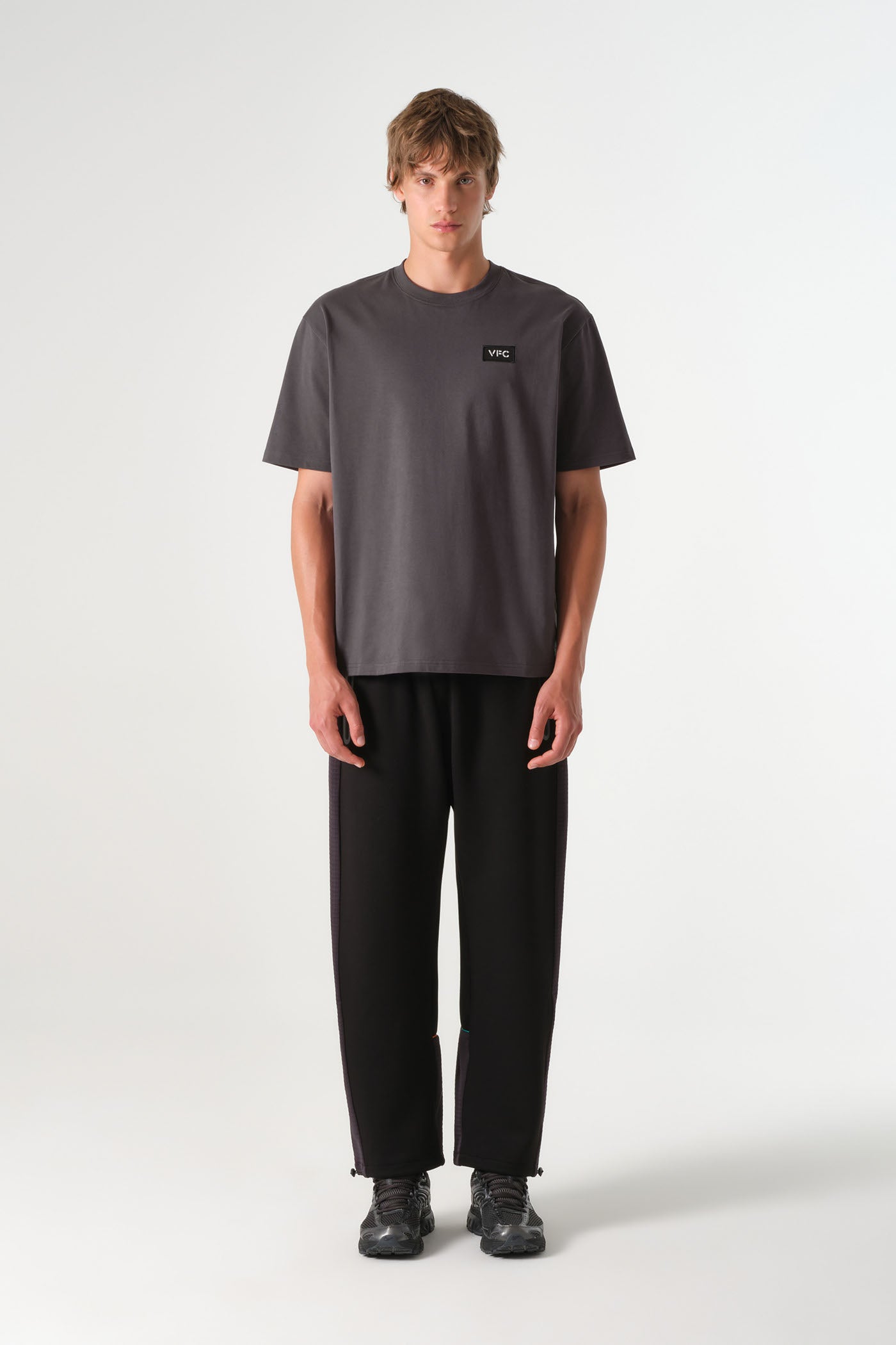 26/27 VFC Travel Lion Statue Tee Dark Grey