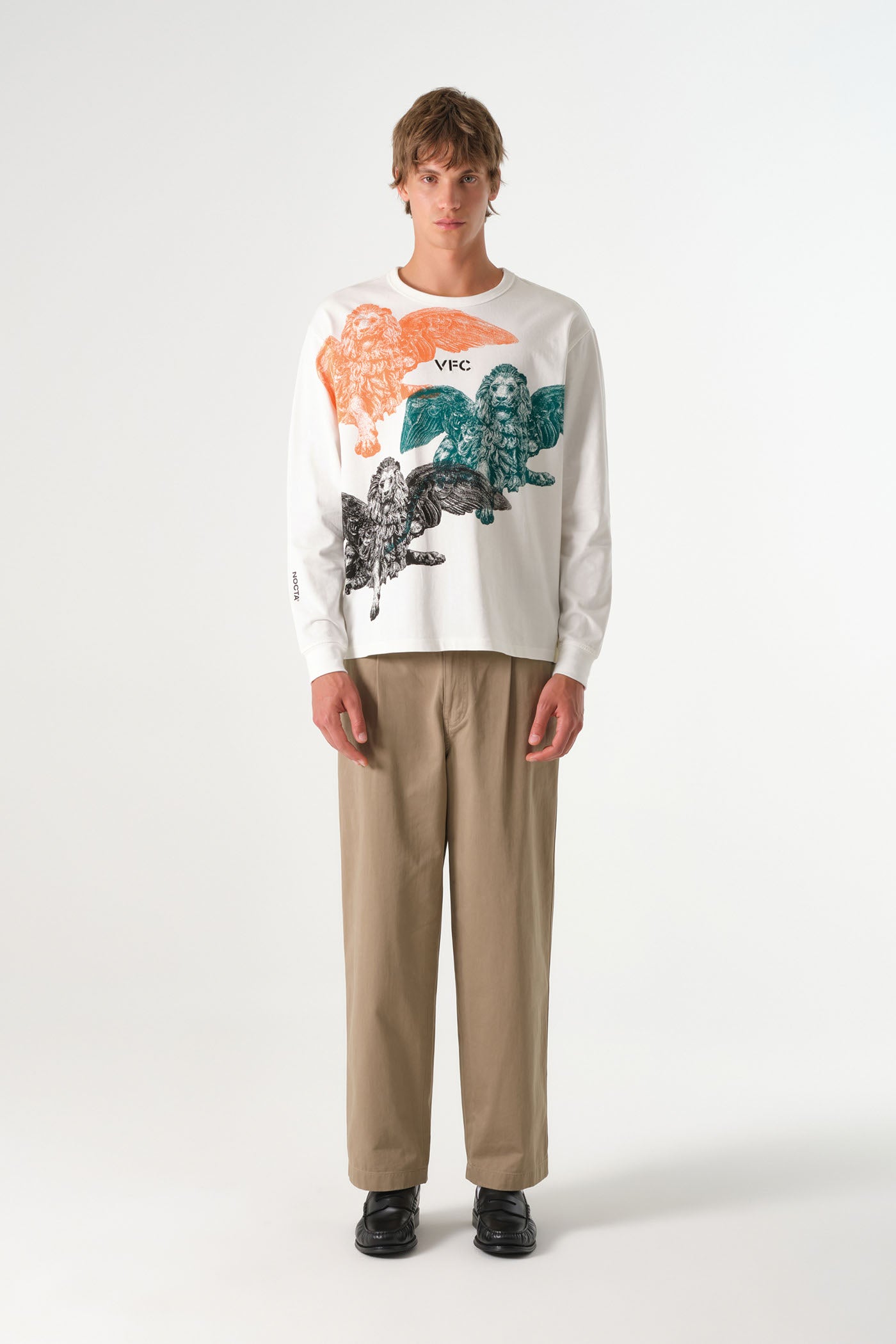 26/27 VFC Travel Lion Statue Tee – Long Sleeves